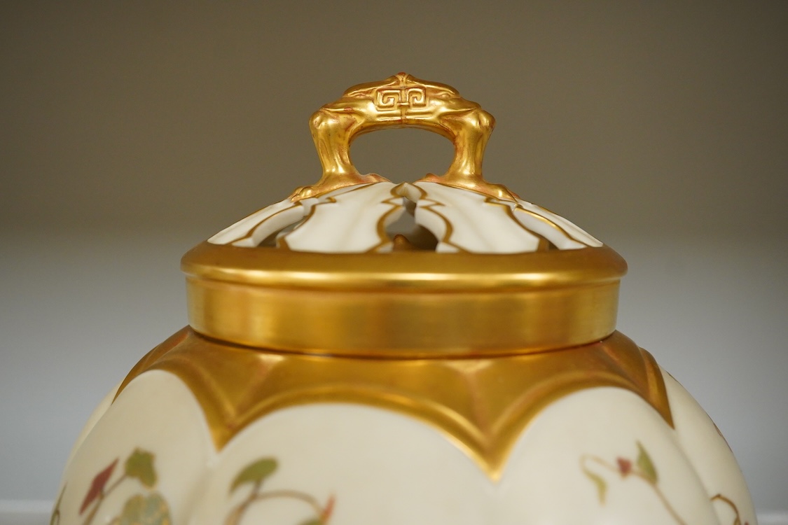 Three 19th century Worcester blush ivory potpourri or biscuit jars and covers, two with liners, each decorated with flowers and buds, largest 20cm high